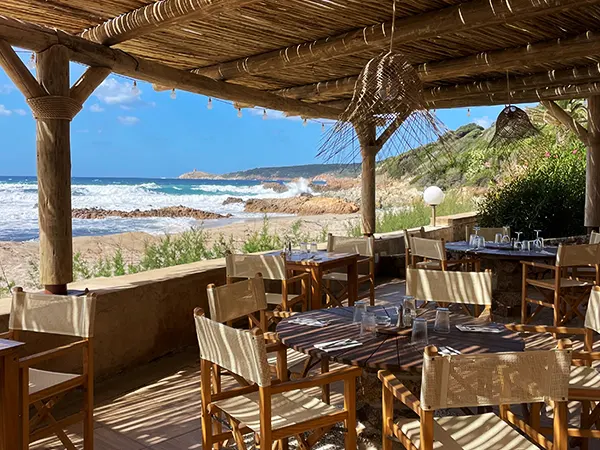 Seafood dish and a glass of wine at a Groot Brak restaurant with an ocean view