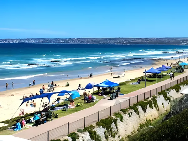 Children playing in the shallow waves on Hartenbos beach
